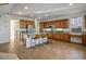 Spacious kitchen with ample counter space, stainless steel appliances, and a breakfast bar at 11569 Velicata Ct, Las Vegas, NV 89138