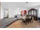 Elegant dining room featuring beautiful tile floors and sophisticated decor at 1589 Silver Mesa Way, Las Vegas, NV 89169