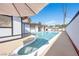 Beautiful in-ground pool with lounge furniture and a patio perfect for relaxing or entertaining at 1589 Silver Mesa Way, Las Vegas, NV 89169