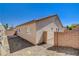 Low maintenance backyard with block wall fencing and desert landscaping at 177 Shaded Peak St, Henderson, NV 89012