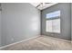Empty bedroom featuring natural light and gray walls at 177 Shaded Peak St, Henderson, NV 89012