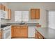 View of kitchen with stainless steel appliances and wooden cabinets at 177 Shaded Peak St, Henderson, NV 89012