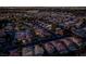 Nighttime aerial perspective displaying well-lit streets and homes in a quiet neighborhood at 2104 Inverness Dr, Henderson, NV 89074