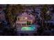 Aerial view of the backyard featuring a private swimming pool, covered patio, and second story balcony at 2104 Inverness Dr, Henderson, NV 89074