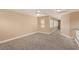 Spacious bonus room boasting a neutral color scheme, plush carpet, and plenty of natural light at 2199 Timescape Ct, Las Vegas, NV 89123