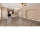 Spacious living room with hard floors and modern lighting at 2199 Timescape Ct, Las Vegas, NV 89123