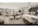 Bright, open-concept design with dining area, living room, and kitchen featuring modern finishes and stylish furnishings at 2607 Regency Cove Ct # Lot 11, Las Vegas, NV 89121