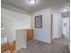 Upstairs hallway with carpet flooring, natural light, and neutral paint at 2732 Dune Cove Rd, Las Vegas, NV 89117