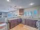 Fully equipped kitchen showcases stainless appliances, and custom cabinetry at 2732 Dune Cove Rd, Las Vegas, NV 89117