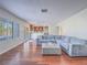 Spacious living room offers hardwood floors and plenty of seating at 2732 Dune Cove Rd, Las Vegas, NV 89117