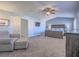 Expansive main bedroom featuring neutral paint, a ceiling fan, and ample space, designed for relaxation at 2732 Dune Cove Rd, Las Vegas, NV 89117