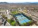 Aerial view showcasing the community tennis and basketball courts plus well-maintained landscaping at 2749 Liberation Dr, Henderson, NV 89044