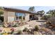 Expansive backyard patio featuring desert landscaping, comfortable seating, and desert views at 2749 Liberation Dr, Henderson, NV 89044