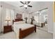 Comfortable bedroom featuring a mirrored closet and a well-lit atmosphere at 2749 Liberation Dr, Henderson, NV 89044