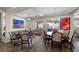 Open-concept living and dining area with elegant furniture and views of the patio at 2749 Liberation Dr, Henderson, NV 89044