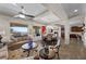 Open living space featuring ample seating, great backyard views, and an adjacent dining area at 2749 Liberation Dr, Henderson, NV 89044