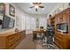 Well-appointed home office with custom cabinetry, ample storage, and a comfortable workspace at 2749 Liberation Dr, Henderson, NV 89044