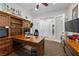 Dedicated office featuring custom built-in shelving and ample desk space at 2749 Liberation Dr, Henderson, NV 89044