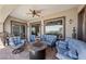 Inviting outdoor patio with comfortable seating and a cozy fire pit, perfect for entertaining at 2749 Liberation Dr, Henderson, NV 89044