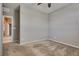 Bedroom features neutral walls, carpet floors, ceiling fan and bright light creating a calming and comfortable retreat at 2915 Moulton Crest Ave, Henderson, NV 89044