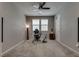 This office has neutral walls, carpet, great natural light, and ample space for productivity at 2915 Moulton Crest Ave, Henderson, NV 89044