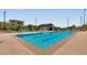 Beautiful community swimming pool offers a refreshing escape with ample lounge chairs for relaxation and leisure at 2915 Moulton Crest Ave, Henderson, NV 89044
