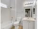 Full bathroom featuring a shower over tub, tile surround, and single sink vanity at 2975 Bluegrass Ln # 811, Henderson, NV 89074