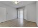 Spacious bedroom featuring neutral colors and a sliding glass door to a private patio at 2975 Bluegrass Ln # 811, Henderson, NV 89074