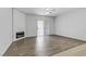 Bright living room with fireplace, ceiling fan, and sliding glass doors at 2975 Bluegrass Ln # 811, Henderson, NV 89074