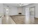 Open living room featuring a fireplace, ceiling fan, and sliding glass doors at 2975 Bluegrass Ln # 811, Henderson, NV 89074
