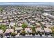 Expansive aerial view of a neighborhood featuring tree-lined streets and well-maintained homes at 3000 Hammerwood Dr, Las Vegas, NV 89135