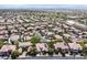 Expansive aerial view of a Las Vegas neighborhood featuring mature landscaping and beautiful single-Gathering homes at 3000 Hammerwood Dr, Las Vegas, NV 89135