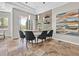 Stylish bar area featuring counter seating, wine storage, and modern lighting fixtures at 3000 Hammerwood Dr, Las Vegas, NV 89135