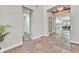 Spacious hallway with tile flooring and arched doorways leading to other rooms at 3000 Hammerwood Dr, Las Vegas, NV 89135