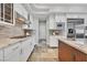 Bright kitchen features granite counters, stainless appliances, and a center island at 3000 Hammerwood Dr, Las Vegas, NV 89135