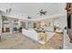 Open living area with comfortable seating, recessed lighting, and seamless flow to the kitchen at 3000 Hammerwood Dr, Las Vegas, NV 89135