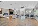 Large living space with a fireplace, bar area, and comfortable seating perfect for entertaining at 3000 Hammerwood Dr, Las Vegas, NV 89135