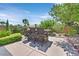 Outdoor bar area with seating, ideal for entertaining guests and enjoying the backyard ambiance at 3000 Hammerwood Dr, Las Vegas, NV 89135