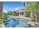 Private swimming pool surrounded by lush landscaping, providing a serene and refreshing backyard oasis at 3000 Hammerwood Dr, Las Vegas, NV 89135