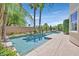 Beautiful swimming pool with manicured landscaping, offering a private and luxurious outdoor experience at 3000 Hammerwood Dr, Las Vegas, NV 89135