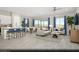 Open-concept living room and kitchen area with modern furnishings, stainless appliances, and ample natural light at 326 Parawan St # Lot 19, Henderson, NV 89015