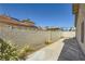 Enclosed backyard featuring a private concrete patio and concrete block fencing for enhanced security and privacy at 335 Simon Bolivar Dr, Henderson, NV 89014