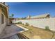 An enclosed backyard with a covered patio and rock landscaping offers a private, low-maintenance outdoor area at 335 Simon Bolivar Dr, Henderson, NV 89014