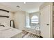 Bright bathroom showcasing a soaking tub with marble accents and modern fixtures at 335 Simon Bolivar Dr, Henderson, NV 89014