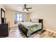 Comfortable bedroom with a plush bed, dresser, and soft natural lighting at 335 Simon Bolivar Dr, Henderson, NV 89014
