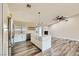 Modern kitchen with island, stainless appliances, and view of living room at 335 Simon Bolivar Dr, Henderson, NV 89014