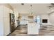 Beautiful kitchen boasts quartz countertops, stainless appliances, and an open floorplan at 335 Simon Bolivar Dr, Henderson, NV 89014