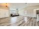 Open floorplan living room with modern floors and bright lighting at 335 Simon Bolivar Dr, Henderson, NV 89014