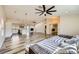Bright living room features vaulted ceilings, modern ceiling fans, and an open floorplan to the kitchen at 335 Simon Bolivar Dr, Henderson, NV 89014