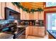 Charming kitchen features granite countertops, light wood cabinets and modern appliances at 401 Alpine Way, Las Vegas, NV 89124